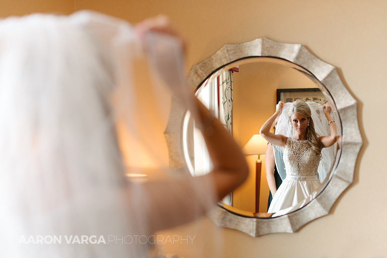 06 bride putting on veil in mirror(pp w768 h512) - Gina + Chris | Oglebay Resort Wedding Photos