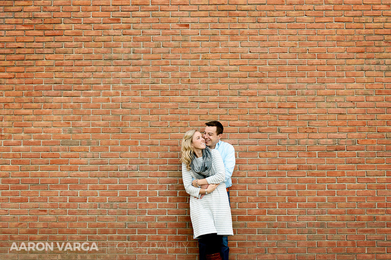 12 washingtons landing brick wall engagement(pp w768 h512) - Annie + Jeff | Washington's Landing and Strip District Engagement Photos