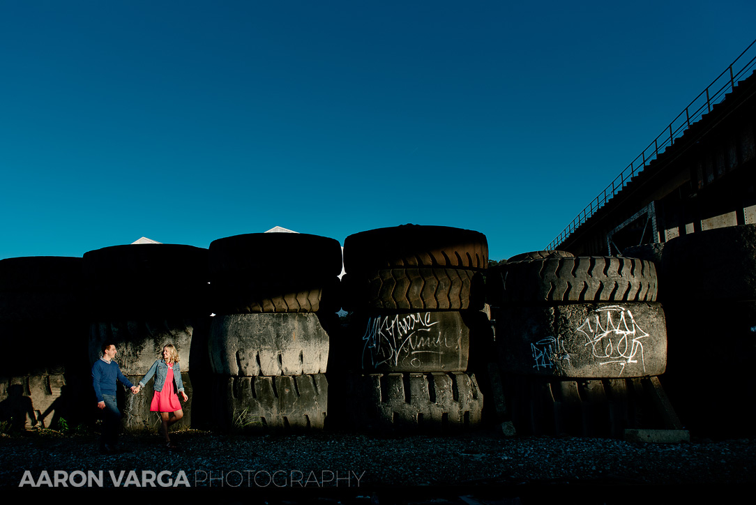 20 strip district engagement in tire yard - Annie + Jeff | Washington's Landing and Strip District Engagement Photos