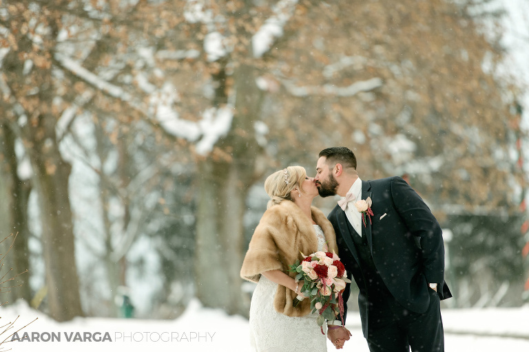 44 couple kissing winter wedding photos(pp w768 h512) - Andrea + Frank | Pittsburgh Airport Marriott Wedding Photos
