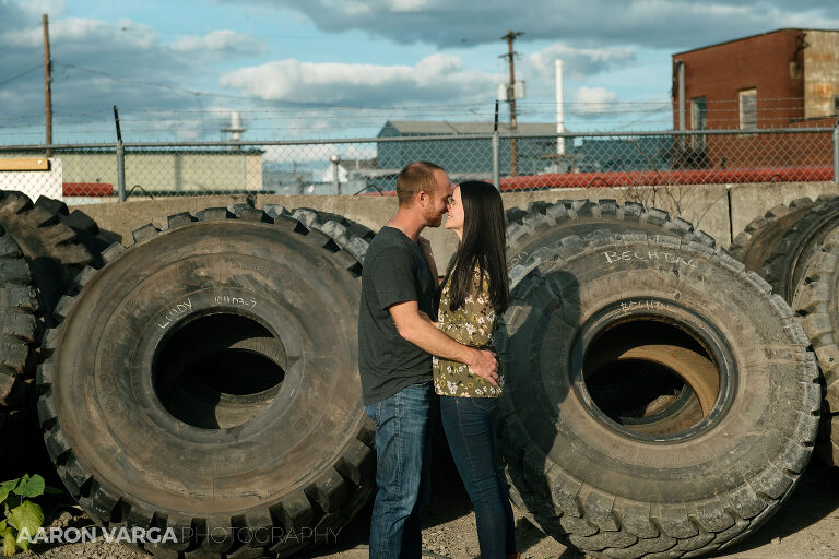12 strip district tire yard engagement photos(pp w768 h512) - Morgan + Greg | Strip District Engagement Photos