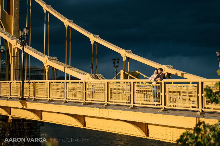 23 dramatic light pittsburgh yellow bridge(pp w768 h511) - Anna + Josh | North Side & North Shore Engagement Photos