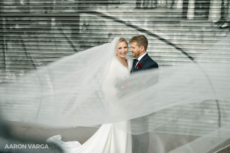 39 bride groom veil photo 1(pp w768 h511) - Brenna + Garrett | Energy Innovation Center Wedding Photos
