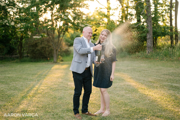 12 champagne pop engagement photos(pp w768 h511) - Steph + Ryan | Washington's Landing Engagement Photos