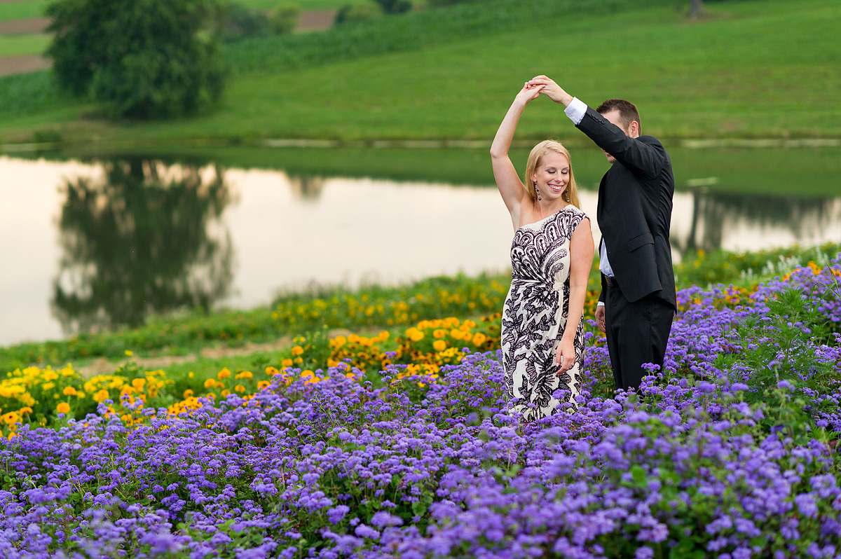 Couple dancing in a field of purple flowers
