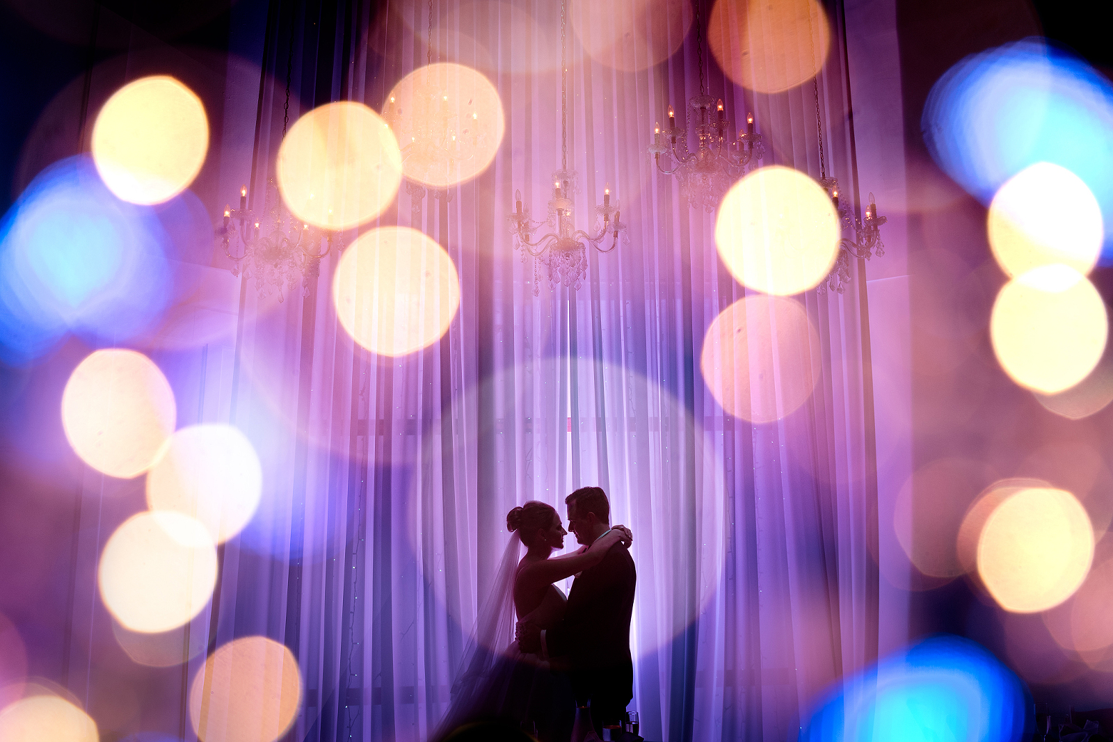 Colorful reception lights at J. Verno Studios