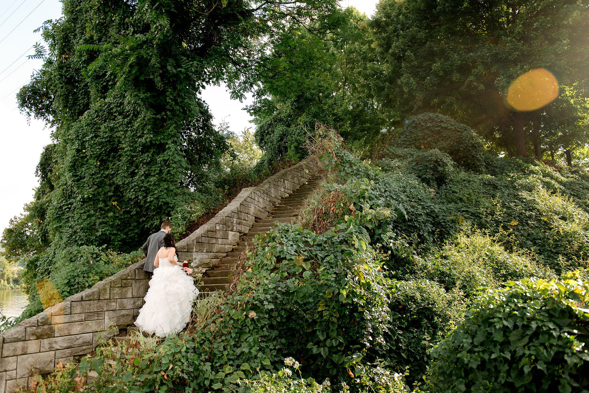 Wedding couple on garden steps at Washington's Landing